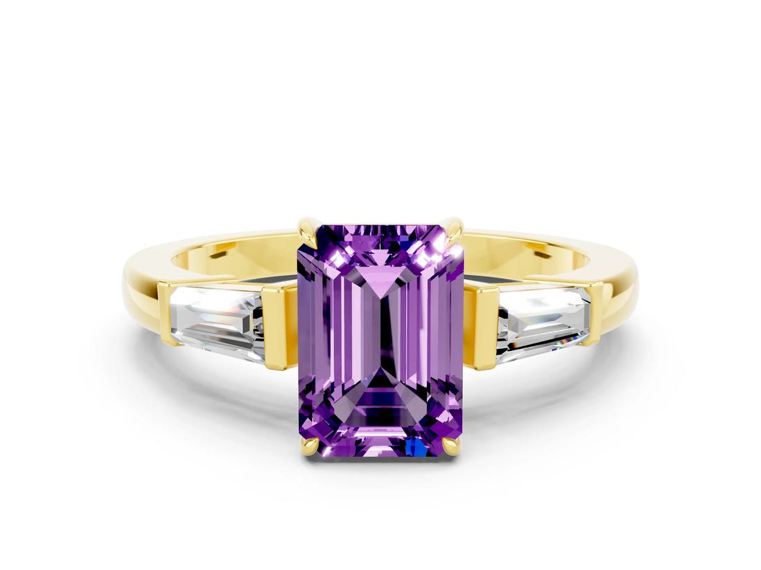 Yellow gold Emerald Cut Cut Diamond Ring with Tapered Baguette Side Stones in Four-Prong Setting