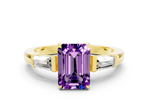Yellow gold Emerald Cut Cut Diamond Ring with Tapered Baguette Side Stones in Four-Prong Setting
