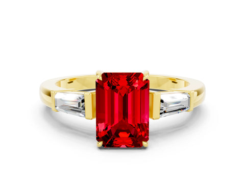 Yellow gold Emerald Cut Cut Diamond Ring with Tapered Baguette Side Stones in Four-Prong Setting