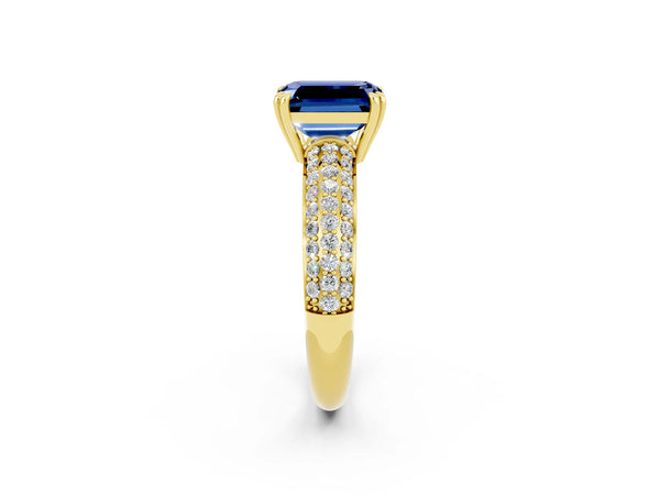 Yellow gold Emerald Cut Blue Sapphire Solitaire Ring with Multi-Row Round Pavé Band and Prong Setting