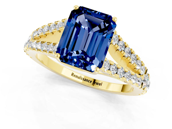 Yellow gold Emerald Cut Blue Sapphire Split Shank Engagement Ring with Round Pavé and Prong Setting