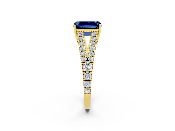 Yellow gold Emerald Cut Blue Sapphire Split Shank Engagement Ring with Round Pavé and Prong Setting