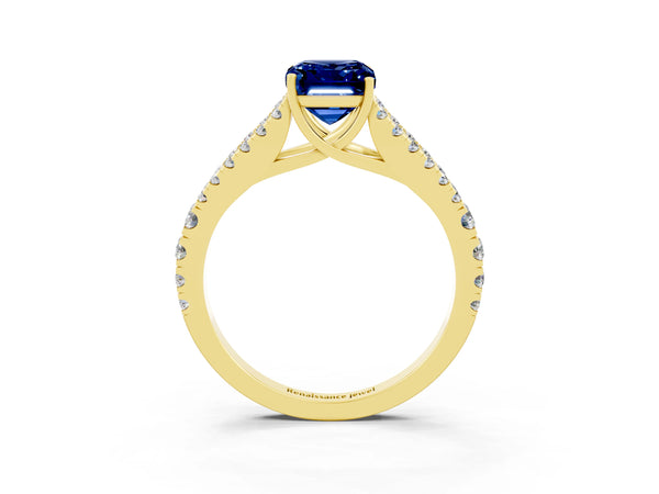 Yellow gold Emerald Cut Blue Sapphire Split Shank Engagement Ring with Round Pavé and Prong Setting
