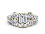 Yellow gold Emerald Cut Diamond Cluster Ring with Round Accent Stones and Prong Setting on a Classic Band_61