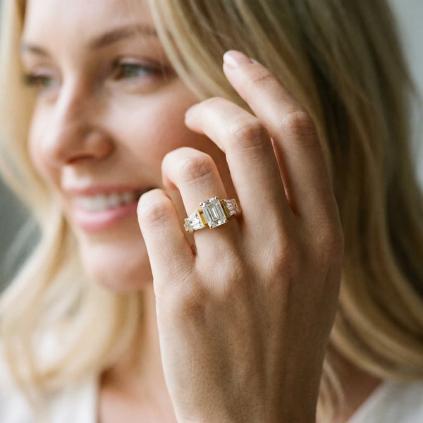 Yellow Gold Emerald Cut Engagement Ring Setting with Channel Set Baguettes and Accented Band