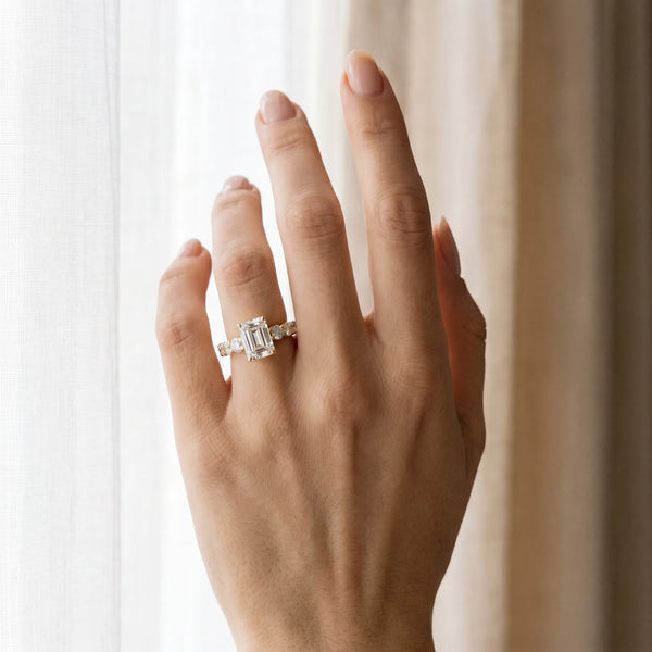 Yellow gold Emerald Cut Diamond Engagement Ring with Pavé Band and Four-Prong Setting
