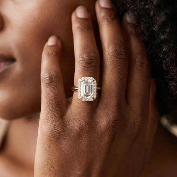 Yellow gold Emerald Cut Diamond Halo Engagement Ring with Split Shank and Four-Prong Setting