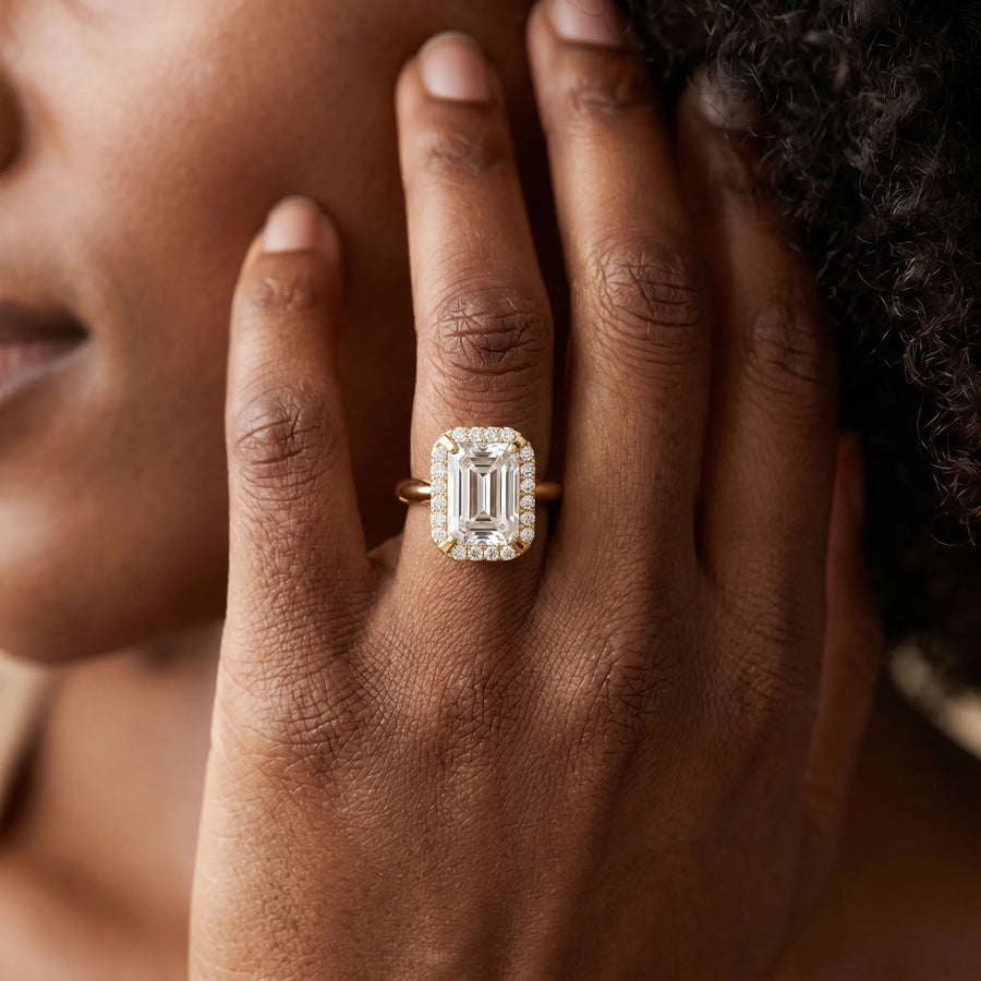 Yellow gold Emerald Cut Diamond Halo Engagement Ring with Split Shank and Four-Prong Setting