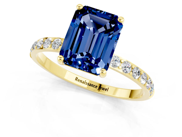 Yellow gold Emerald Cut Blue Sapphire Solitaire Ring with Round Pavé Shoulders and Prong Setting