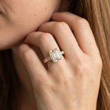 Yellow gold Emerald Cut Diamond Ring with Baguette Side Stones, Channel Set Band, and Four-Prong Setting_15
