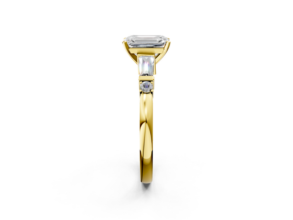 Yellow gold Emerald Cut Diamond Ring with Baguette Side Stones, Channel Set Band, and Four-Prong Setting