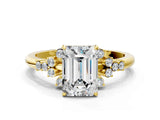 Yellow gold Emerald Cut Diamond Ring with Side Stones and Four-Prong Setting_132