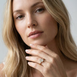 Yellow gold Emerald Cut Diamond Ring with Tapered Baguette Side Stones in Four-Prong Setting_45