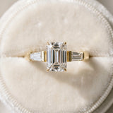Yellow gold Emerald Cut Diamond Ring with Tapered Baguette Side Stones in Four-Prong Setting_47