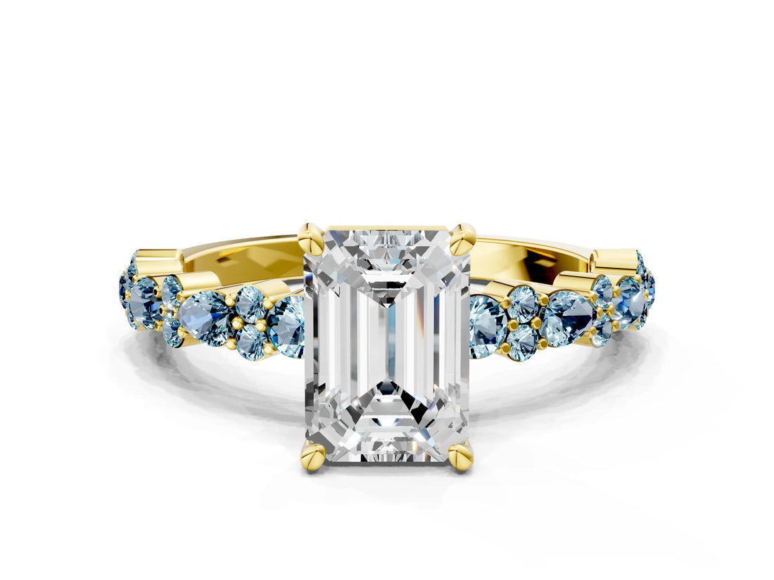 Yellow gold Emerald Cut Diamond Side Stone Solitaire Ring with Round with Aquamarine side stone and Four-Prong Setting