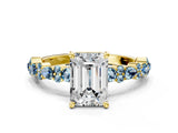 Yellow gold Emerald Cut Diamond Side Stone Solitaire Ring with Round with Aquamarine side stone and Four-Prong Setting