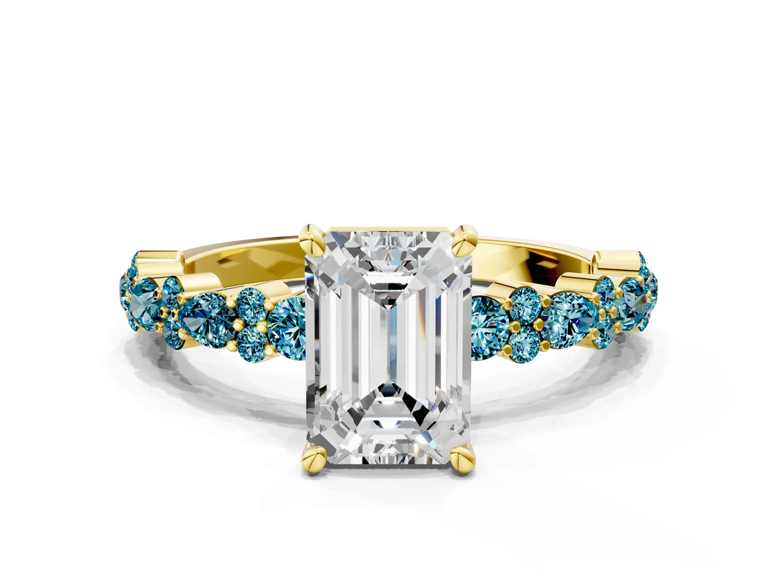 Yellow gold Emerald Cut Diamond Side Stone Solitaire Ring with Round with Blue Topaz side stone and Four-Prong Setting