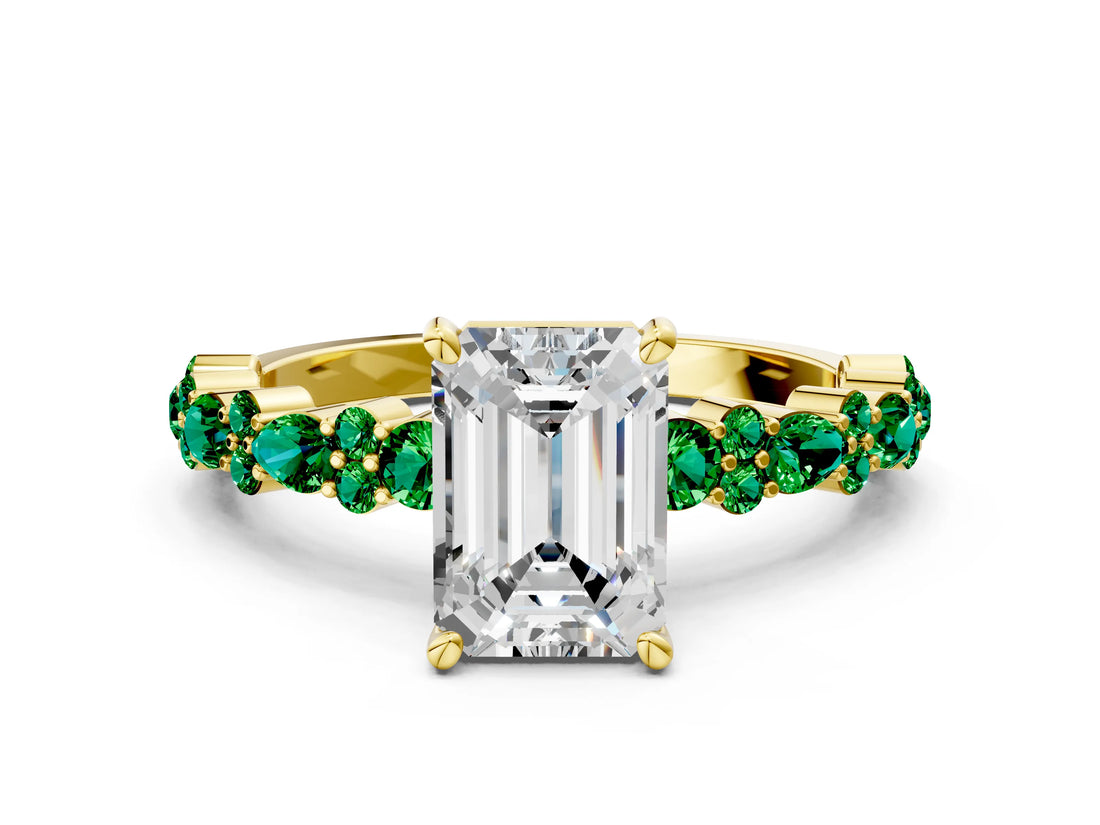 Yellow gold Emerald Cut Diamond Side Stone Solitaire Ring with Round with Emerald side stone and Four-Prong Setting