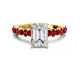 Yellow gold Emerald Cut Diamond Side Stone Solitaire Ring with Round with Ruby side stone and Four-Prong Setting