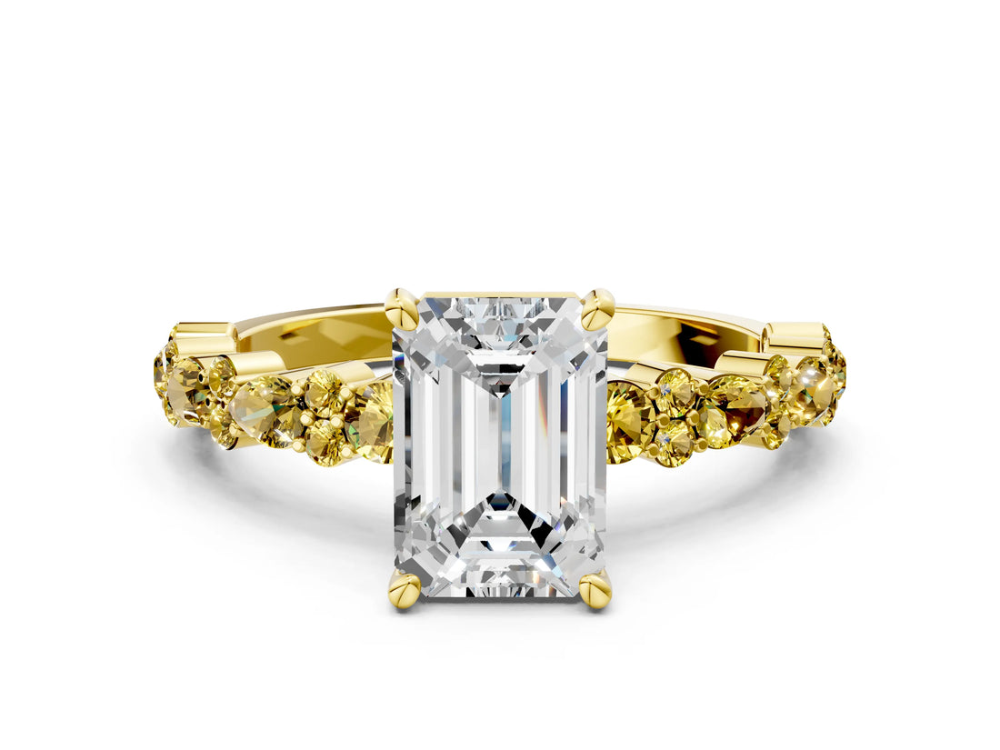Yellow gold Emerald Cut Diamond Side Stone Solitaire Ring with Round with Yellow Sapphire side stone and Four-Prong Setting