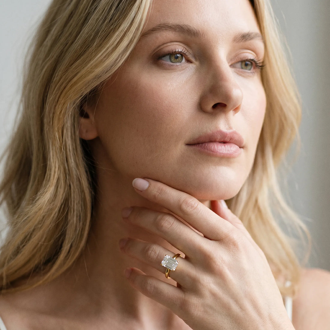 Yellow gold Emerald Cut Diamond Solitaire Engagement Ring with Classic Band and Four-Prong Setting_148