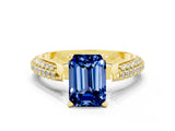 Yellow gold Emerald Cut Diamond Solitaire Engagement Ring with Pavé Band and Four-Prong Setting