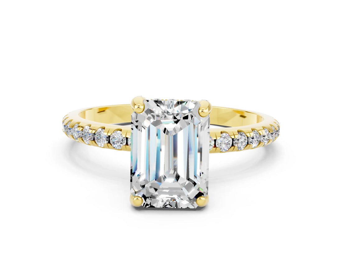 Yellow gold Emerald Cut Diamond Solitaire Ring with Four-Prong Setting and Pavé Band