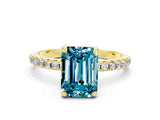 Yellow gold Emerald Cut Diamond Solitaire Ring with Four-Prong Setting and Pavé Band