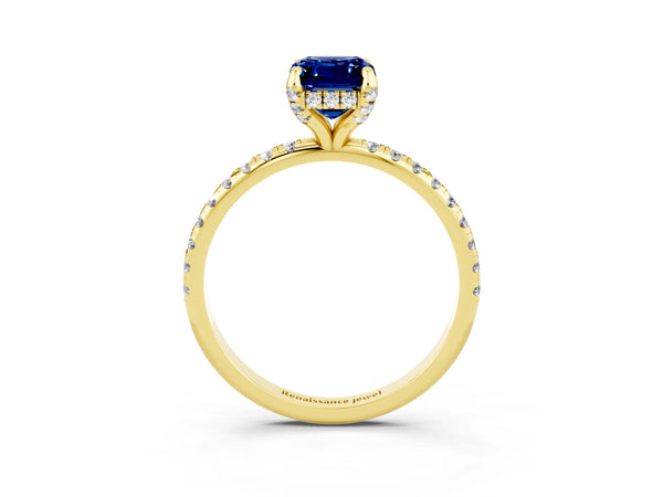 Yellow gold Emerald Cut Blue Sapphire Hidden Halo Engagement Ring with Round Pavé Band and Prong Setting