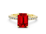 Yellow gold Emerald Cut Diamond Solitaire Ring with Four-Prong Setting and Pavé Band
