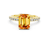 Yellow gold Emerald Cut Diamond Solitaire Ring with Four-Prong Setting and Pavé Band