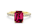 Yellow gold Emerald Cut Diamond Solitaire Ring with Four-Prong Setting and Pavé Band