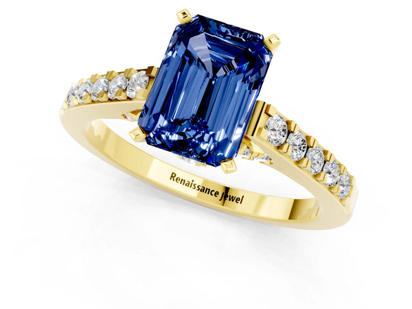Yellow gold Emerald Cut Blue Sapphire Solitaire Ring with Crossover Gallery and Round  Pavé Band