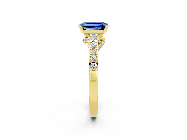 Yellow gold Emerald Cut Blue Sapphire Solitaire Ring with Crossover Gallery and Round  Pavé Band