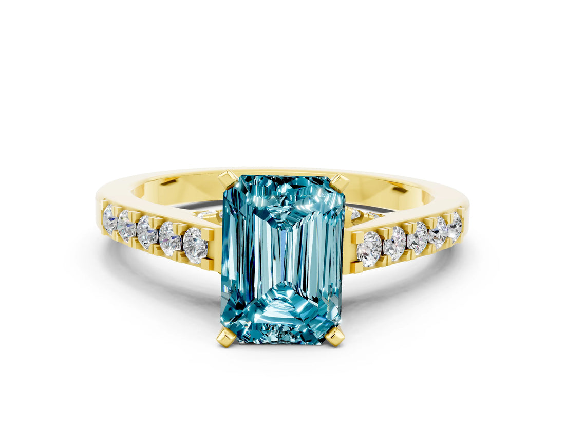 Yellow gold Emerald Cut Diamond Solitaire Ring with Pavé Band and Prong Setting