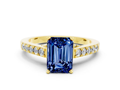 Yellow gold Emerald Cut Diamond Solitaire Ring with Pavé Band and Prong Setting