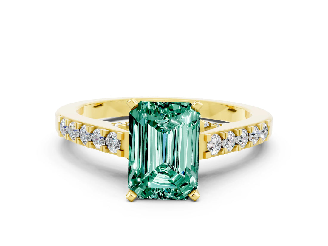 Yellow gold Emerald Cut Diamond Solitaire Ring with Pavé Band and Prong Setting
