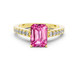 Yellow gold Emerald Cut Diamond Solitaire Ring with Pavé Band and Prong Setting