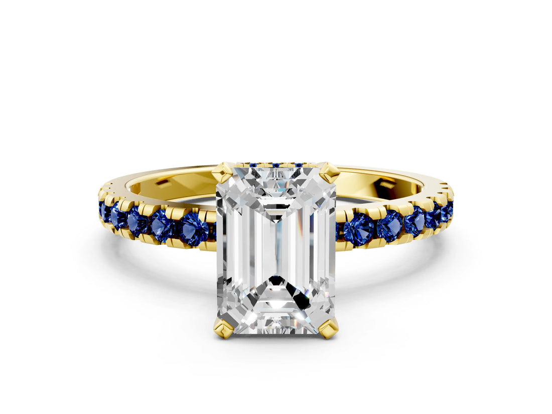Yellow gold Emerald Cut Diamond Solitaire Ring with Round with Blue Sapphire side stone Pavé Band and Four-Prong Setting_36