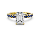 Yellow gold Emerald Cut Diamond Solitaire Ring with Round with Blue Sapphire side stone Pavé Band and Four-Prong Setting_36