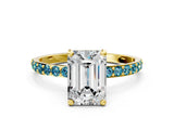 Yellow gold Emerald Cut Diamond Solitaire Ring with Round with Blue Topaz side stone Pavé Band and Prong Setting_12