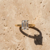 Yellow gold Emerald Cut Diamond Solitaire Ring with Six-Prong Setting and Classic Band_17