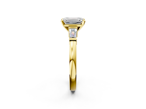 Yellow gold Emerald Cut Diamond Solitaire Ring with Tapered Baguette Accents and Four-Prong Setting