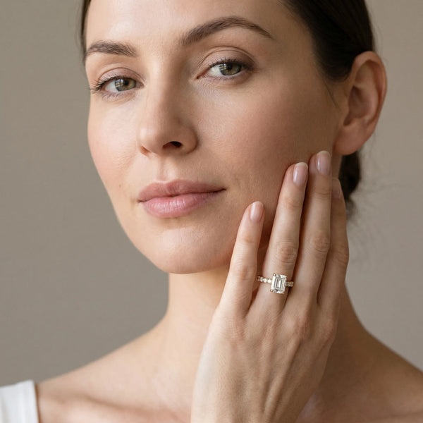 Yellow gold Emerald Cut Diamond Solitaire Ring with U-Prong Diamond Band and Four Prong Setting