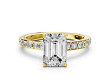 Yellow gold Emerald Cut Diamond Solitaire with Pave Band and Four-Prong Setting