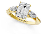 Yellow gold Emerald Cut Diamond Three-Stone Ring with Pear Side Stones and Four-Prong Setting_93