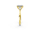 Yellow gold Emerald Cut Diamond Three-Stone Ring with Pear Side Stones and Four-Prong Setting_94