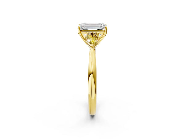 Yellow gold Emerald Cut Diamond Three-Stone Ring with Pear Yellow Sapphire Side Stones and Prong Setting