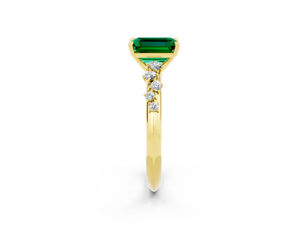 Yellow gold Emerald Cut Emerald Cluster Side Stone Solitaire Ring with Prong Setting