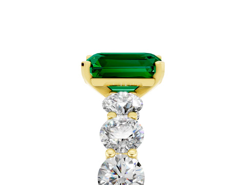 Yellow gold Emerald Cut Emerald Prong Setting with Side Stones on a Pave Band_5